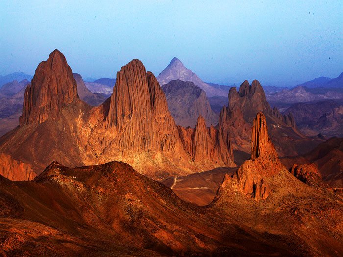 Jagged volcanic peaks of the Hoggar Mountains near Tamanrasset at sunset