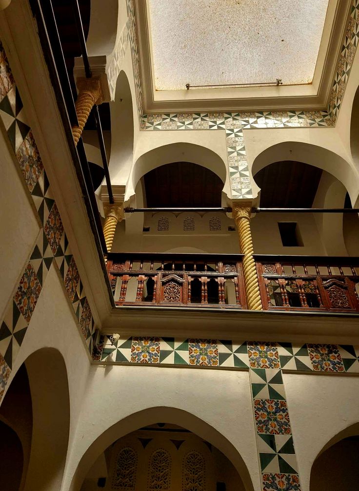Tiled arcaded courtyard with twisted columns inside the Palace of the Rais in Algiers