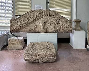 Roman stone pediment carved with Mercury on display in the Cirta Museum, Constantine
