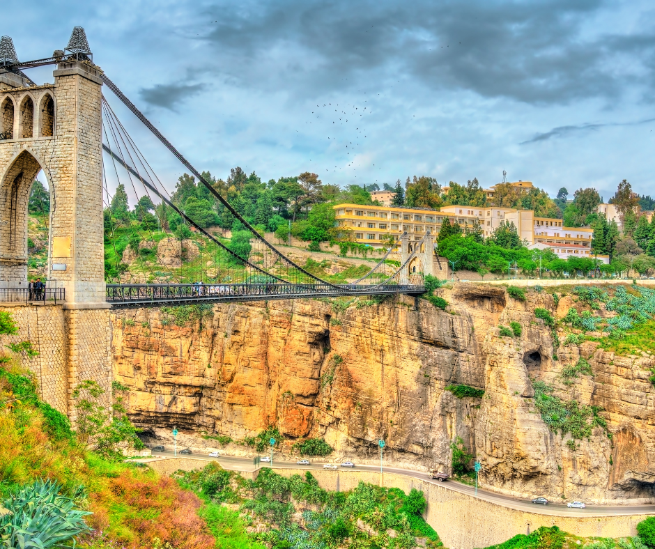 Suspension bridge crossing the gorge in Constantine above a rocky cliff