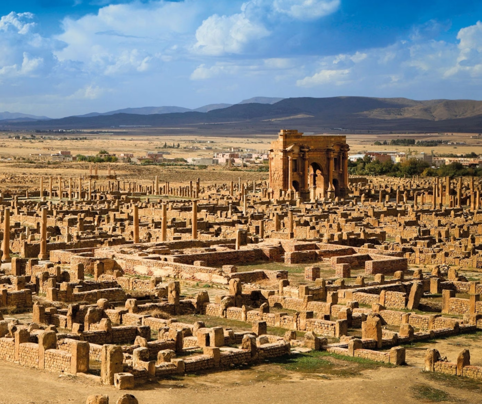 Roman street grid of Timgad with the arch of Trajan beyond